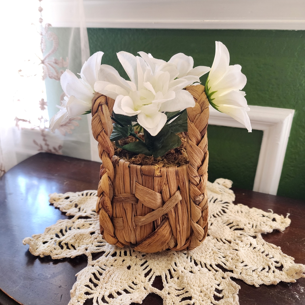 Woven Basket with White Flower Accent